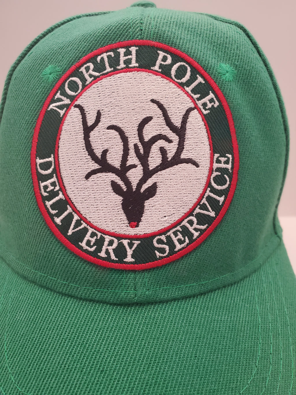 Green “North Pole Delivery Service” Embroidered Cap